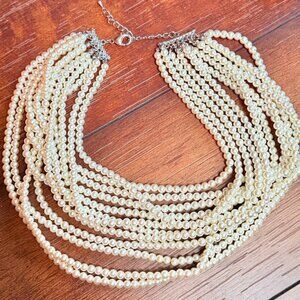 Strands of faux pearls